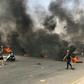 Protests erupt in Baghdad for a second straight day prompting security forces to fire live rounds in the air despite calls for restraint from President Barham Saleh