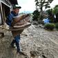 Clean-up and rescue efforts continued in Japan three days after Typhoon Hagibis slammed into the country
