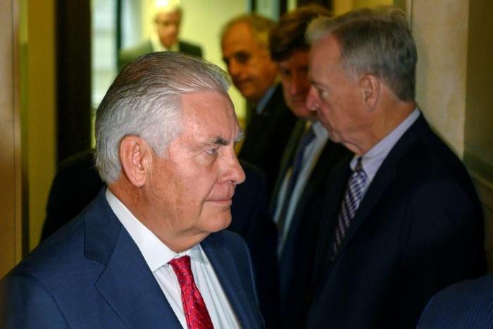 Former US secretary of state Rex Tillerson enters the courtroom to testify in the Exxon trial on October 30, 2019 in New York