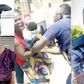 Ms Osafo [L] being assaulted by Skalla [R] as captured in the viral video
