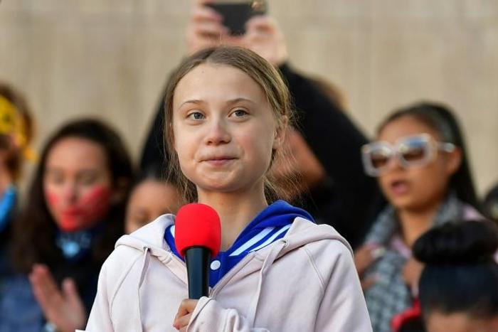 Swedish environment activist Greta Thunberg speaks during a "FridaysForFuture" climate protest at Civic Center Park in Denver, Colorado, on October 11, 2019