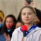 Swedish environment activist Greta Thunberg speaks during a "FridaysForFuture" climate protest at Civic Center Park in Denver, Colorado, on October 11, 2019