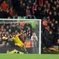A Mohamed Salah (R) header beats Manchester City goalkeeper Claudio Bravo to give Liverpool a two-goal lead in an English Premier League clash at Anfield