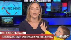 TV news anchor’s son disrupts live broadcast of breaking news by tickling her (video)
