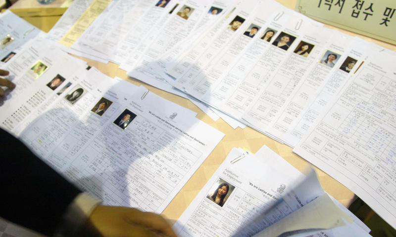 It's typical for job applications in South Korea to require an ID photo. Because of that, many job applicants in South Korea say they feel the pressure to appear good-looking, whether it's to be a flight attendant, an engineer, or a cashier.
