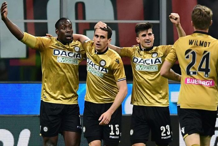 Italian forward Kevin Lasagna (2ndL) grabbed a point for Udinese at the San Siro