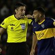 Boca Juniors forward Ramon Abila (right) remonstrates with Brazilian referee Raphael Claus during the Copa Libertadores semi-final, first leg defeat to River Plate