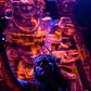 Actors perfom in front of an altar dedicated to the underworld at the "Gran Ofrenda" (Mega Offering) installed in the Chapultepec Forest in Mexico City, for Day of the Dead