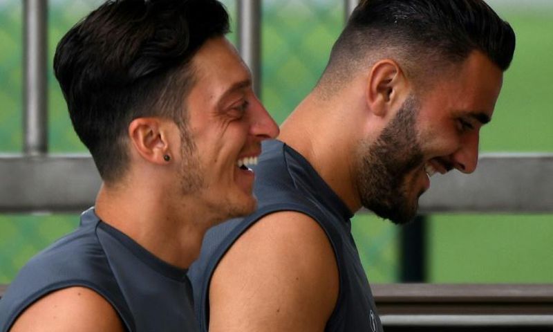 The bravery of Sead Kolasinac (right) was praised in court after he and Arsenal teammate Mesut Ozil (left) were attacked by armed robbers