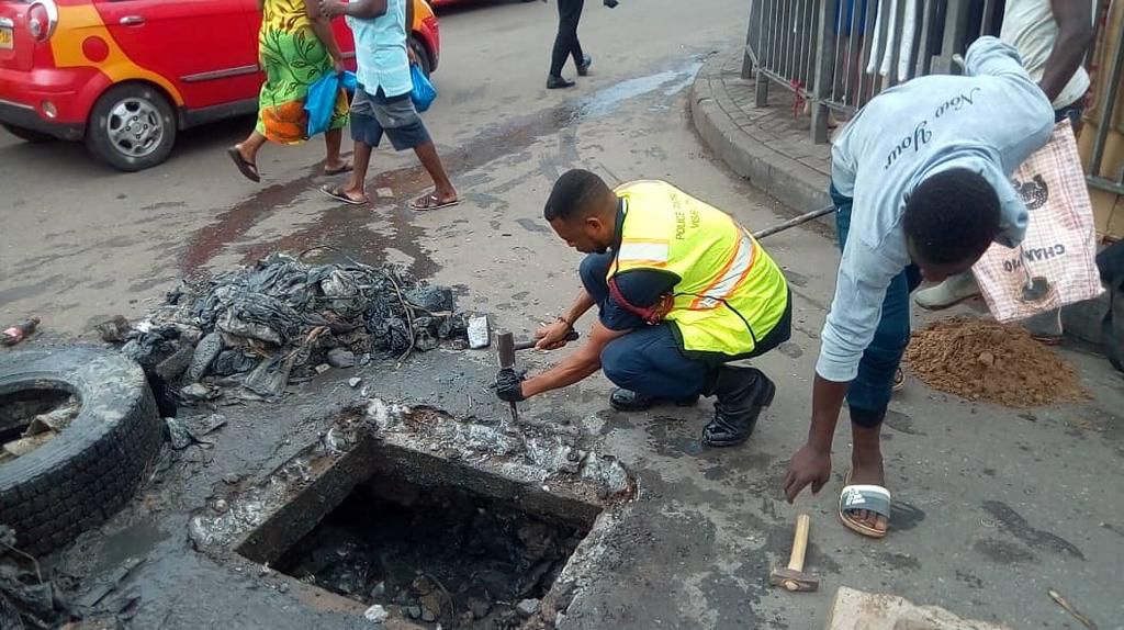 Lance Corporal Simon Agbeko desilts choked drains in Accra