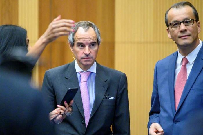 Acting Director General of IAEA, Romania's Cornel Feruta (r), and Argentina's Mariano Grossi are vying for the top IAEA job