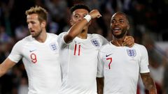 Talented trio: Harry Kane (left), Jadon Sancho (centre) and Raheem Sterling (right) have scored 14 goals in four Euro 2020 qualifiers