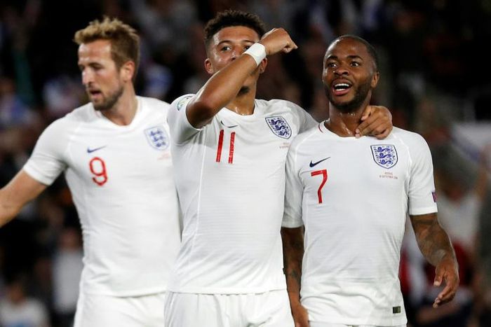 Talented trio: Harry Kane (left), Jadon Sancho (centre) and Raheem Sterling (right) have scored 14 goals in four Euro 2020 qualifiers