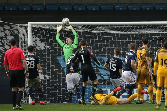 Millwall goalkeeper David Martin misses a Solly March free-kick as Brighton make it 2-2 in the fifth minute of added on time in an FA Cup quarter-final. Brighton then won 5-4 on penalties