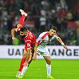 A file photo of Al Masry forward Mahmoud Wadi (R) playing for Palestine against Syria during the 2019 Asian Cup in the United Arab Emirates