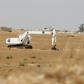 Iraqi mine clearers working for Halo Trust, a non-profit organization specialized in mine removal, scan an agricultural area near Iraq’s Baiji, an oil-rich region ravaged by fighting against the Islamic State group in 2014