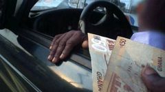 Bribe-taking police officer spotted lying to his colleagues about the amount he collected from a motorist