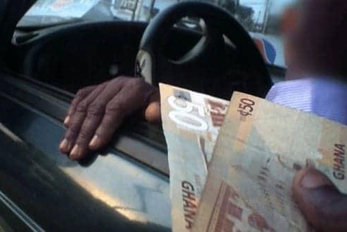 Bribe-taking police officer spotted lying to his colleagues about the amount he collected from a motorist