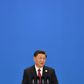 President Xi Jinping called on the world community to 'knock down walls instead of building walls'