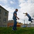 Carsten Hoffmann (L) and his wife who originate from eastern Germany have moved back after years in the west