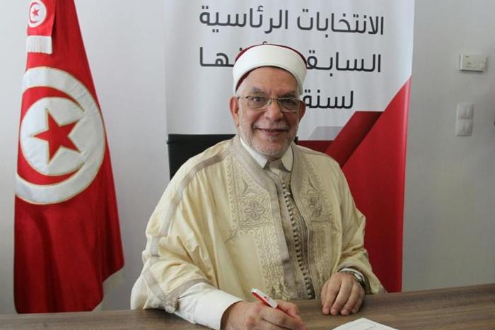 Abdelfattah Mourou, Tunisia's interim parliament speaker from the Islamist-inspired Ennahdha party, submits his candidacy for the September 15 presidential election