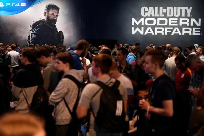 Russian state media and gamers have railed at what they see as anti-Russian "propaganda" in the US video game "Call of Duty" (visitors wait for "Call of Duty - Modern Warfare" during Gamescom in Cologne, western Germany, in August 2019)