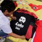 Street vendors offers jerseys urging the release from jail of former Brazilian President Luiz Inacio Lula da Silva; his girlfriend Rosangela da Silva tweeted on November 8, 2019 'I'm coming for you, wait for me'