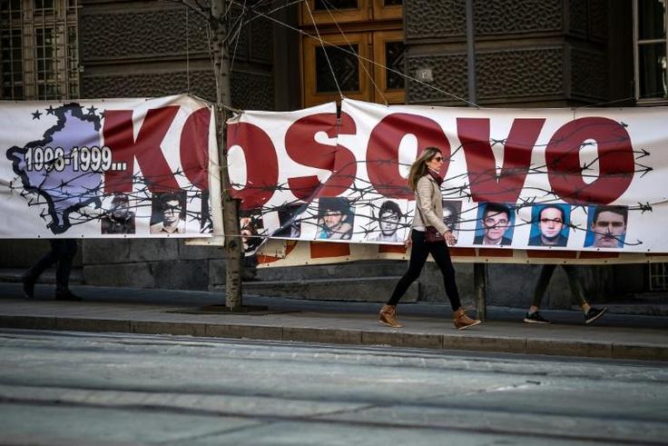 A banner commemorates the anniversary in Belgrade