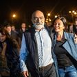 Turkish journalist and writer Ahmet Altan walks with his daughter Sanem Altan after being released from prison