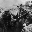 Picture taken in 1944 shows Polish and Soviet soldiers in ramparts on the front near Warsaw during World War II. Poland says it lost millions of lives and suffered much destruction and claims it is entitled to German reparations.