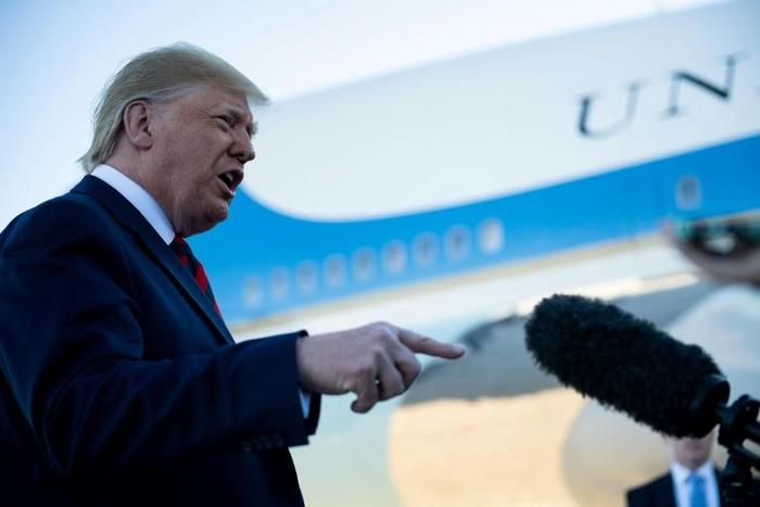 US President Donald Trump speaks to the press before boarding Air Force One at Andrews Air Force Base October 28, 2019, in Maryland en route to Chicago.