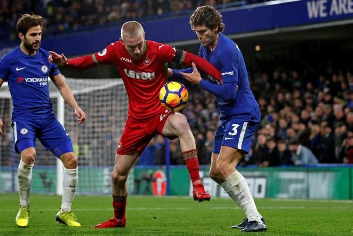 Oli McBurnie (C) was involved in row over his commitment to Scotland