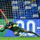 Salzburg'sErling Braut Haland (L) scores a penalty past Napoli goalkeeper Alex Meret