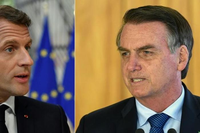 France's President Emmanuel Macron (left) has accused Brazilian President Jair Bolsonaro of lying to him about Brazil's climate change stance