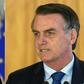 France's President Emmanuel Macron (left) has accused Brazilian President Jair Bolsonaro of lying to him about Brazil's climate change stance