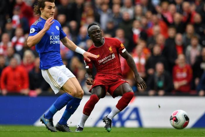 Senegalese Sadio Mane (R) scores for Liverpool against Leicester City at Anfield