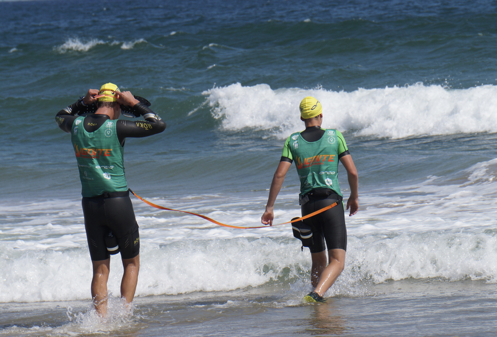 You have to stay within ten feet of each other, and some teams choose to tether.