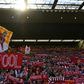 Liverpool fans wave flags at Anfield