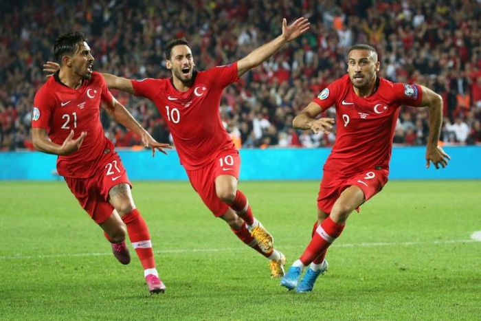 Turkey players reportedly made a military salute after Cenk Tosun (right) scored a last-gasp winning goal in the 1-0 win against Albania on Friday