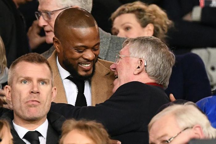 Patrice Evra with Alex Ferguson at the Man Utd v PSG first leg