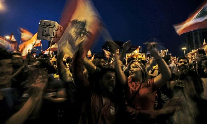 For days, hundreds of demonstrators have taken over Al-Nour Square in the heart of Tripoli for protest raves after dark in scenes unprecedented for Lebanon's relatively conservative Sunni Muslim heartland