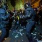 Protesters clashed with Catalan regional police during a protest in front of the Spanish Government delegations in Barcelona