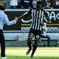Chadian Casimir Ninga celebrates with coach Stephane Moulin after scoring for Angers against Saint-Etienne