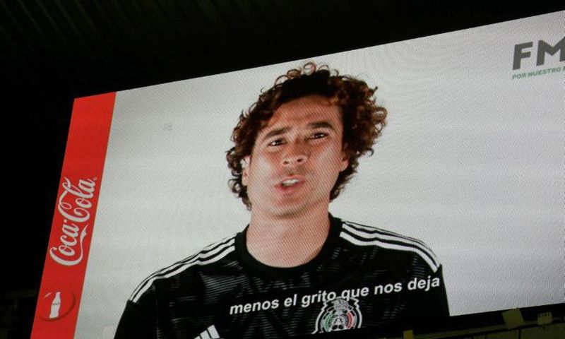 Mexican goalkeeper Guillermo Ochoa speaks out against homophobic chants in a message screened at the Azteca Stadium in Mexico City on October 15, 2019