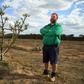 Angus Ferrier stands by his few remaining citrus trees at his drought-hit orchard Stanthorpe, regional Queensland