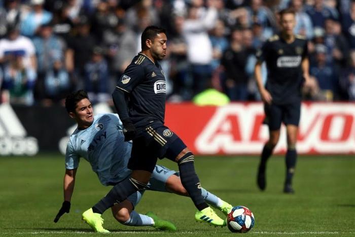 Philadelphia's Marco Fabian scored the winning goal in extra time as the Union beat the New York Red Bulls 4-3 in a Major League Soccer playoff game Sunday