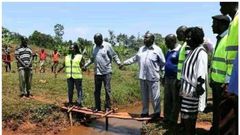 Photo of officials commissioning a tiny footbridge goes viral