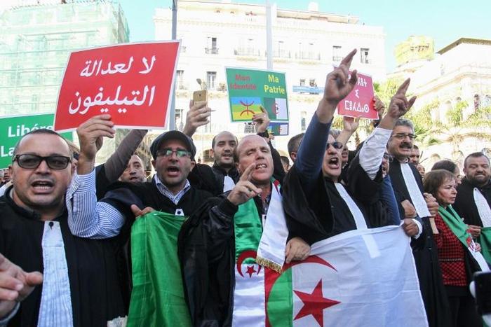 Lawyers take part in a demonstration demanding the independence of the judiciary system in Algiers on October 24, 2019