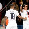 Angel Di Maria celebrates with Mauro Icardi after scoring one of his two goals as Paris Saint-Germain beat Real Madrid 3-0 in their Champions League opener