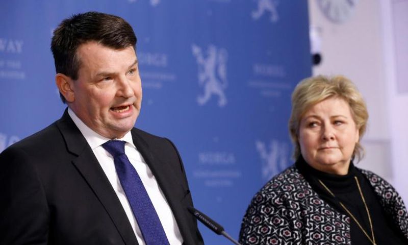 Norwegian Prime Minister Erna Solberg said she would miss justice minister Tor Mikkel Wara (L) who resigned after his partner allegedly faked attacks on the couple